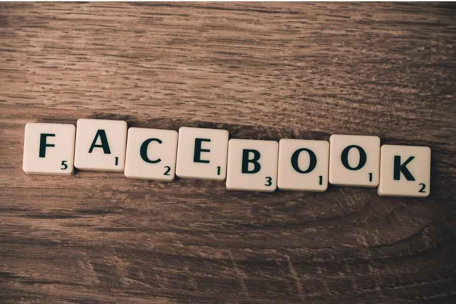 facebook tile letters on a wooden tabletop