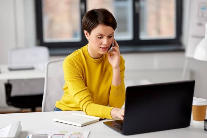 professional writer woman making business call